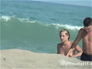 bare beach voyeur shoots a super hot honey with a hidden web cam